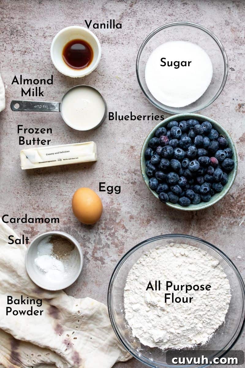 Blueberry Cardamom Scones Recipe — Flaky, Aromatic Breakfast Treat 3 Scones ingredients on a counter in bowls.