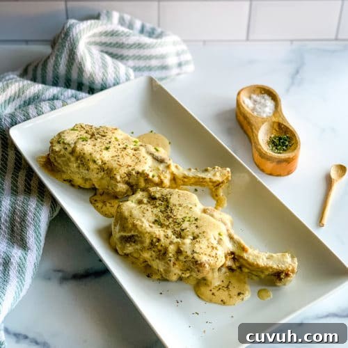 Creamy Pork Chops with Garlic Herb Sauce—Weeknight Dinner Recipe 7 platter of ranch pork chops, ready to serve.