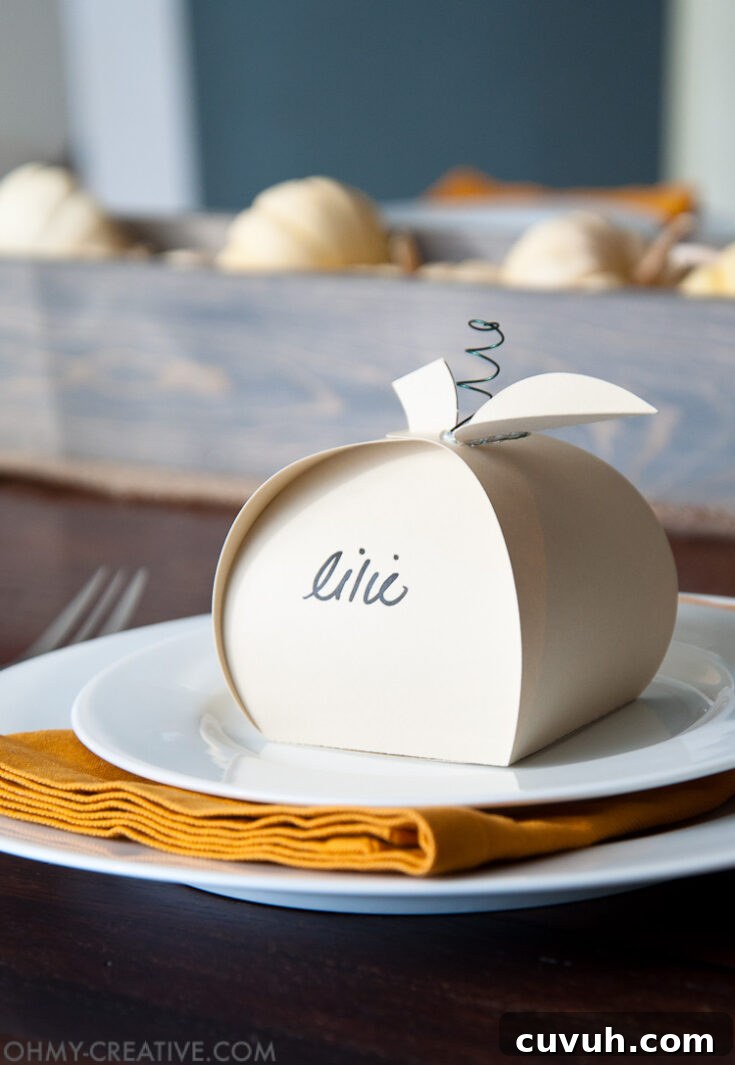 Make these easy paper pumpkins for your Thanksgiving table or any DIY Thanksgiving decorations.