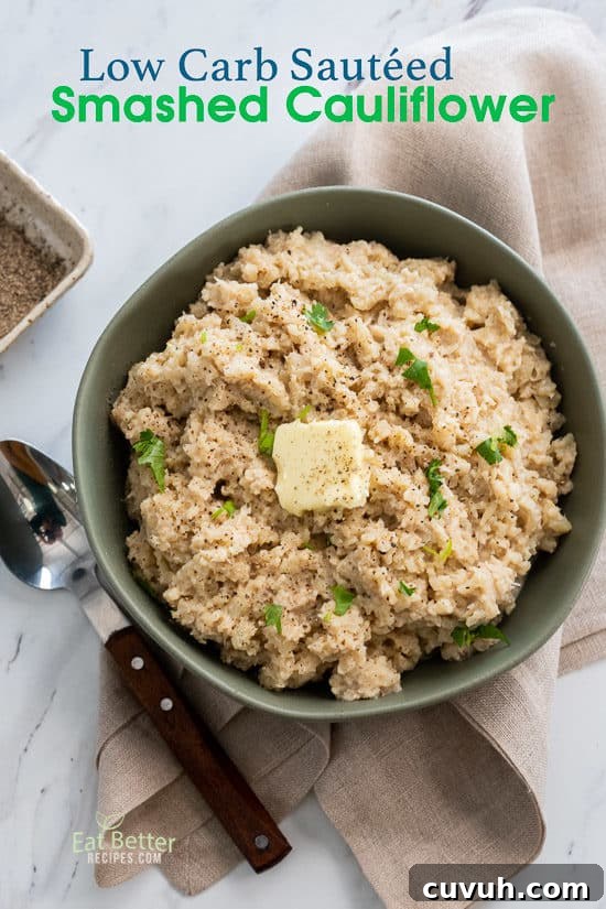 keto Smashed Cauliflower Recipe in a bowl with spoon