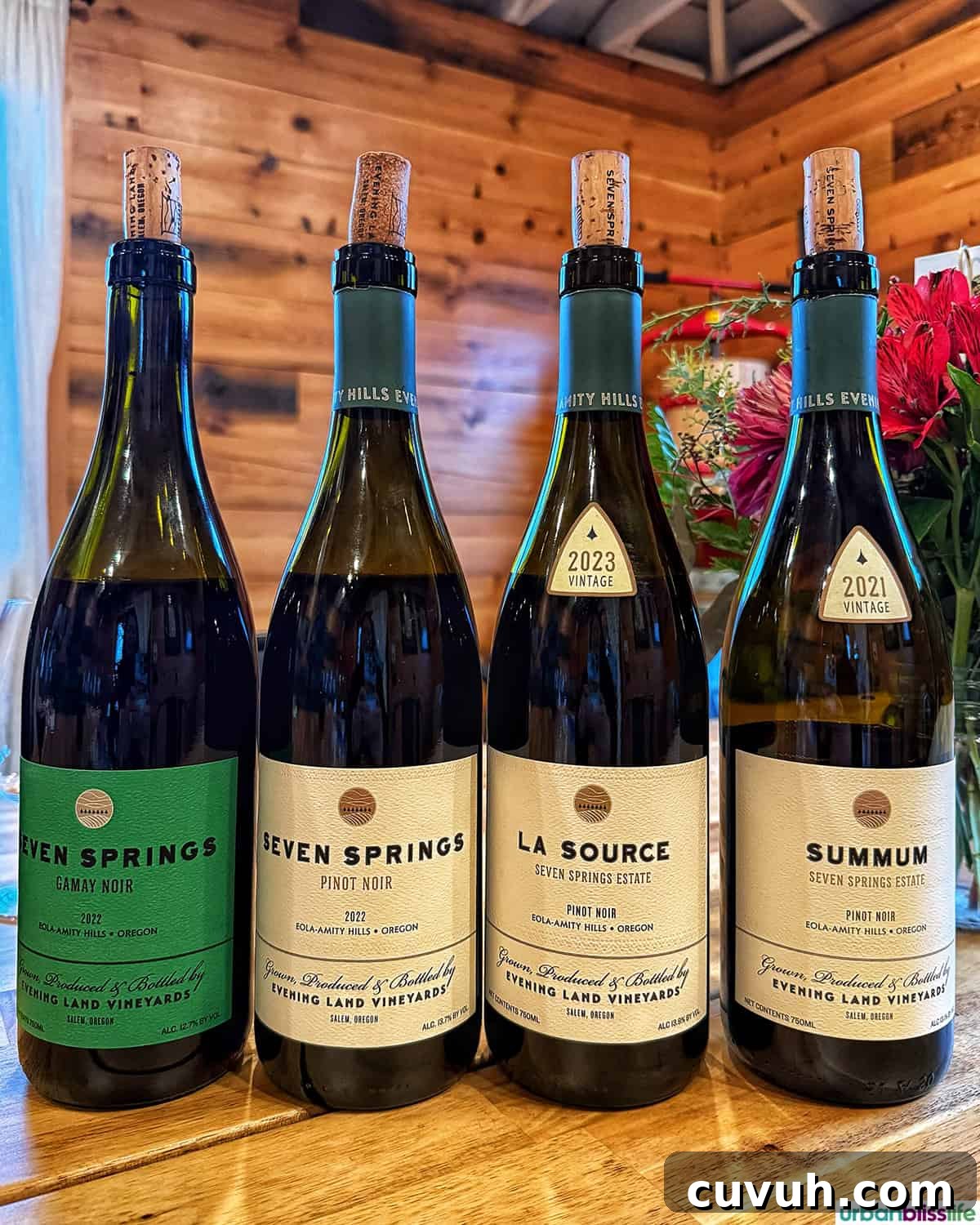 Evening Land Vineyards Pinot Noir and Gamay wine bottles.