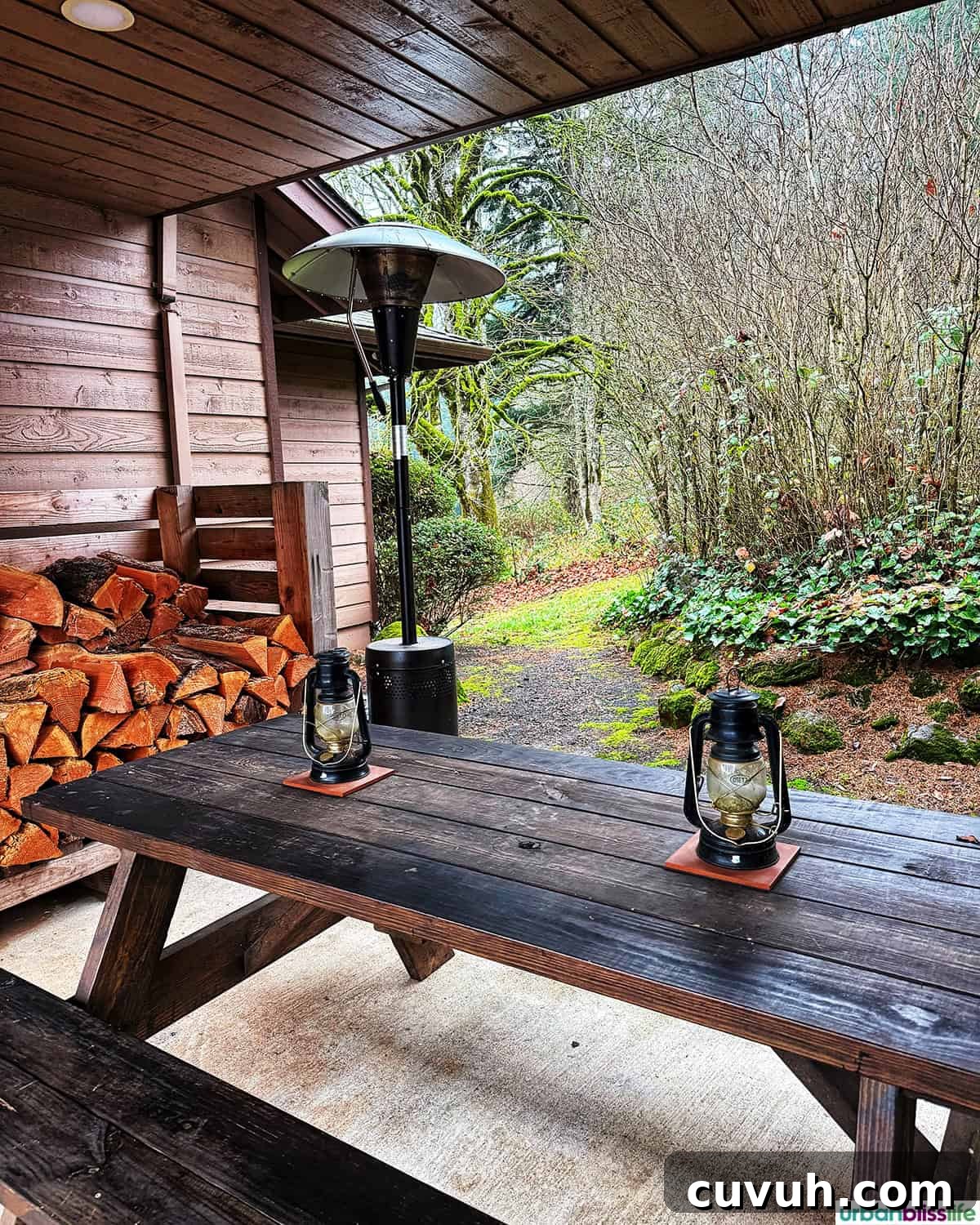 picnic table and wood pile at Evening Land Vineyards.