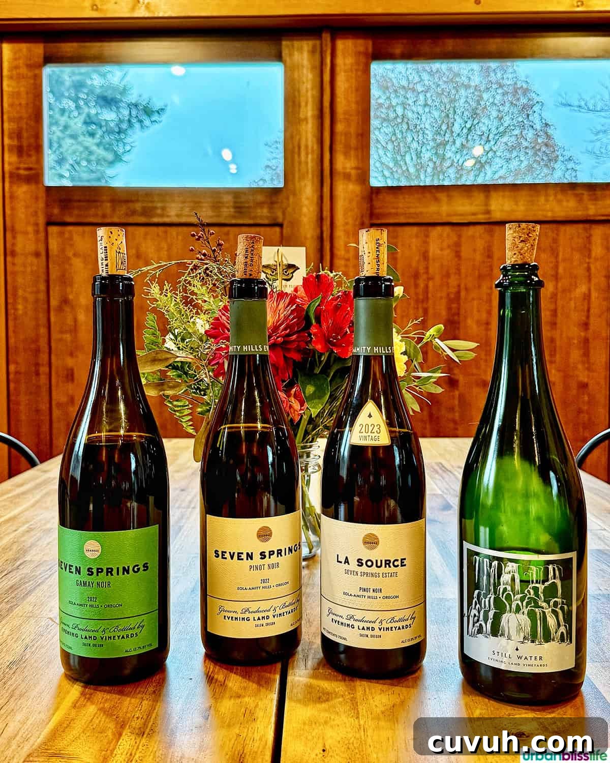 four Evening Land Vineyard wine bottles 