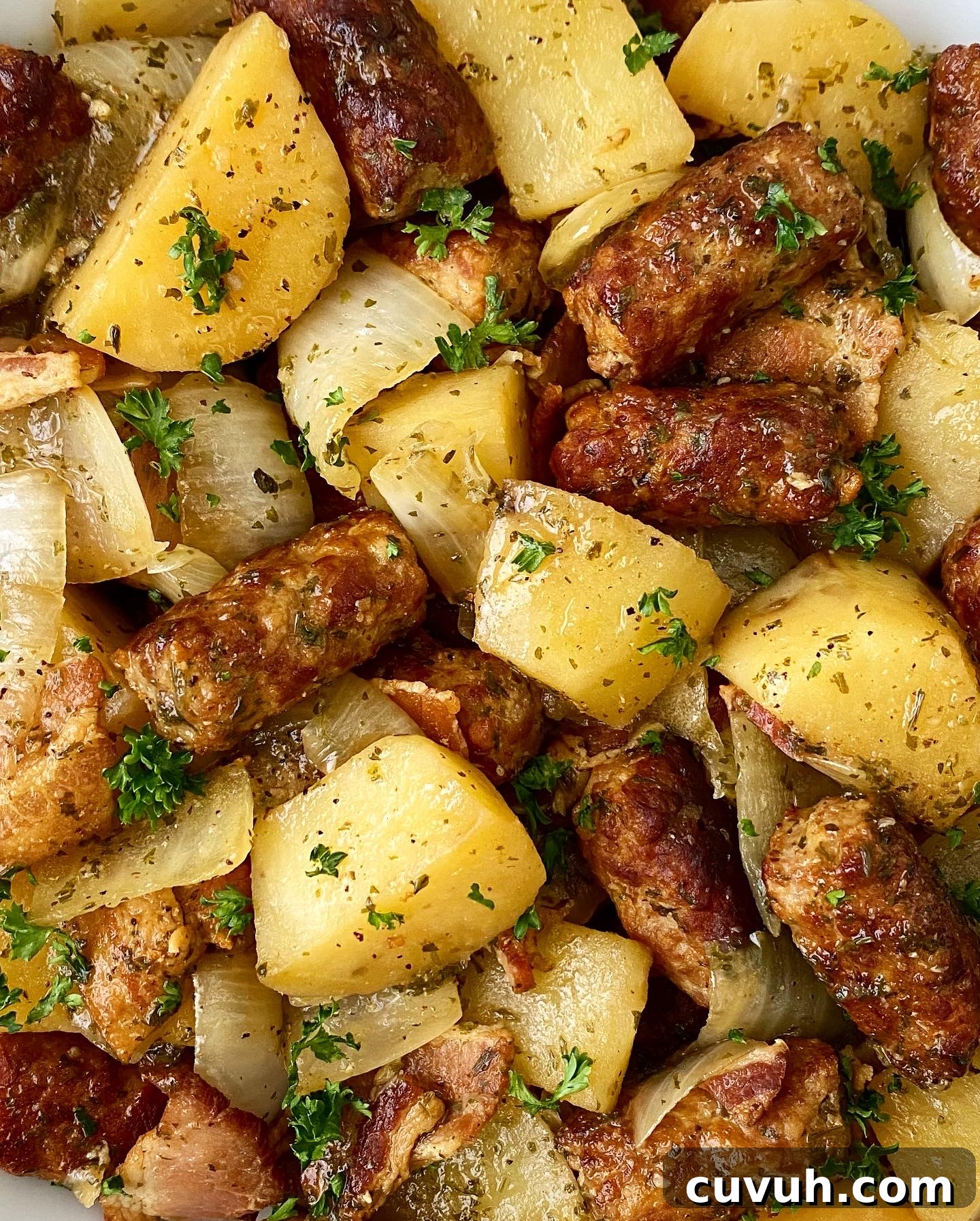 close up shot of irish dublin coddle in a white bowl