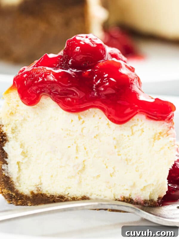 Decadent Strawberry Cheesecake Recipe with Fresh Berry Topping 16 Cherry cheesecake with graham cracker crust.