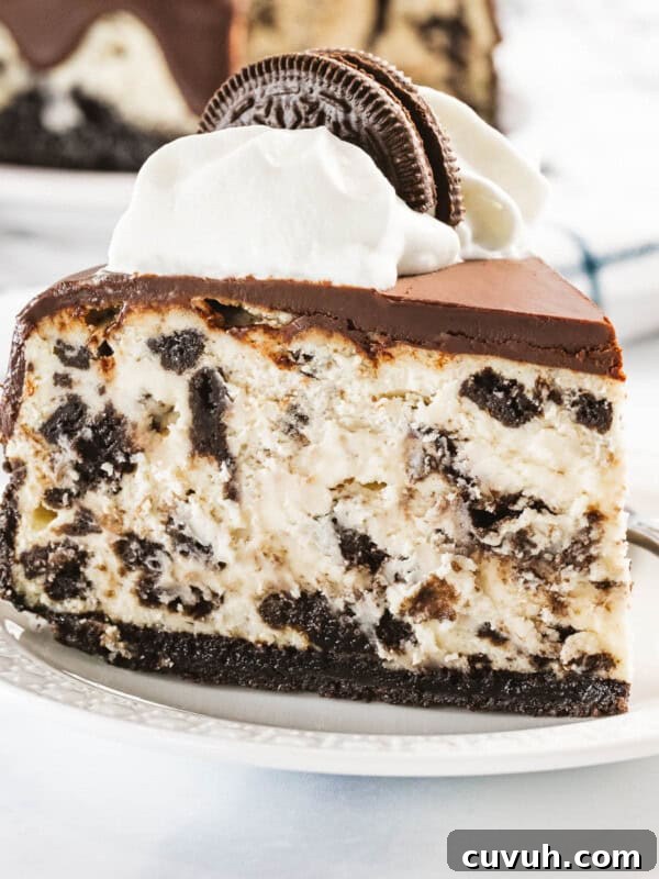 Decadent Strawberry Cheesecake Recipe with Fresh Berry Topping 18 Oreo cheesecake with chocolate ganache and whipped cream.