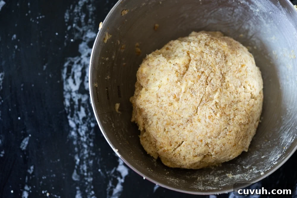 Keto Peach 'n' Cream Shortcake Recipe for Low-Carb Desserts 7 The keto shortcake dough rolled into a ball in a gray bowl