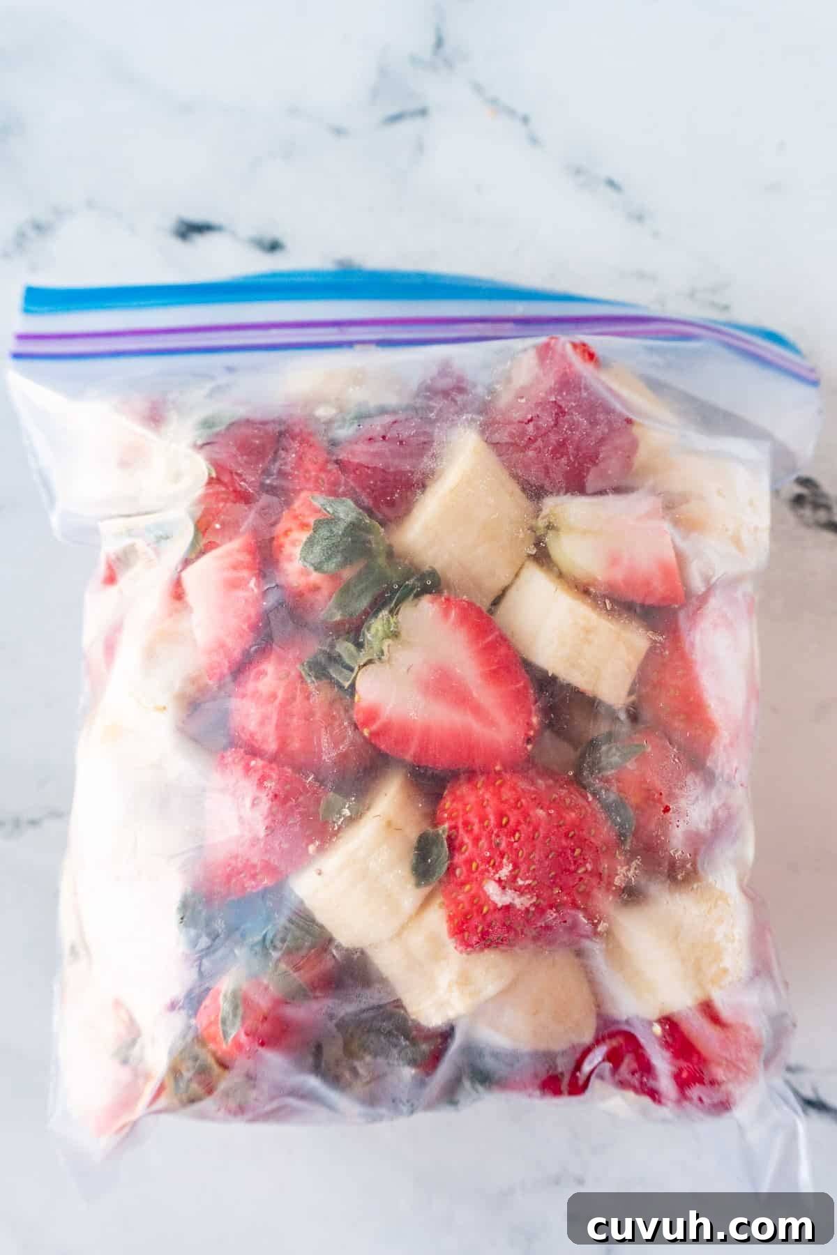How to Freeze Bananas for Smoothies, Baking, and Snacks 14 frozen banana strawberry mix in freezer bag