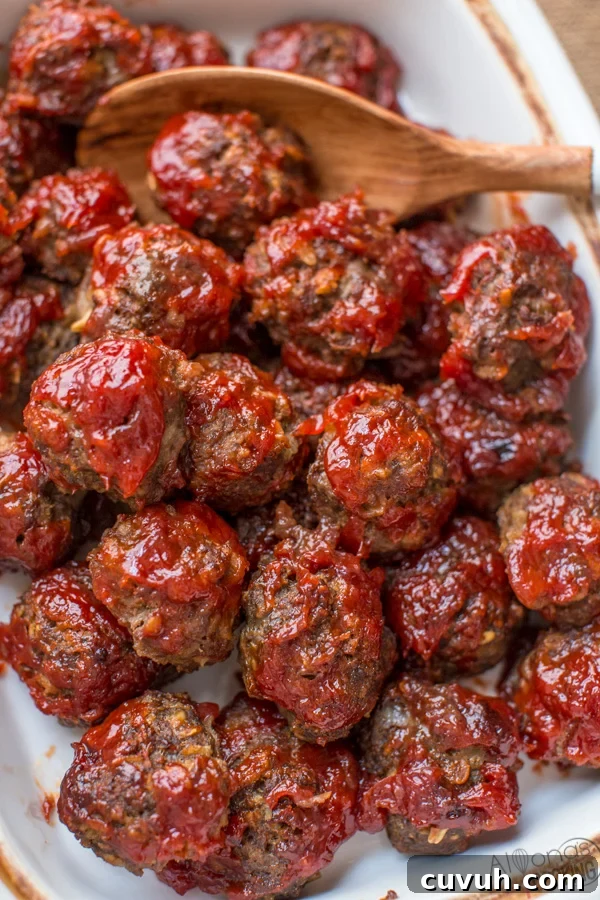 Baked BBQ Meatballs with Sticky Homemade Glaze 4 baked bbq meatballs in a baking dish