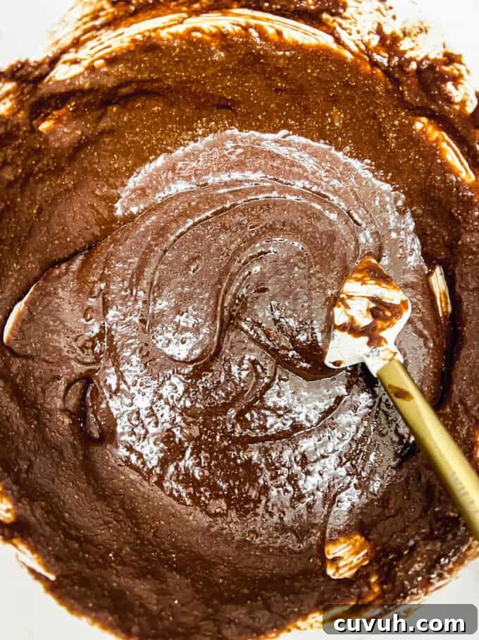 Paleo Almond Butter & Jelly Brownies — Gluten-Free Recipe 9 The wet and dry ingredients mixed together.