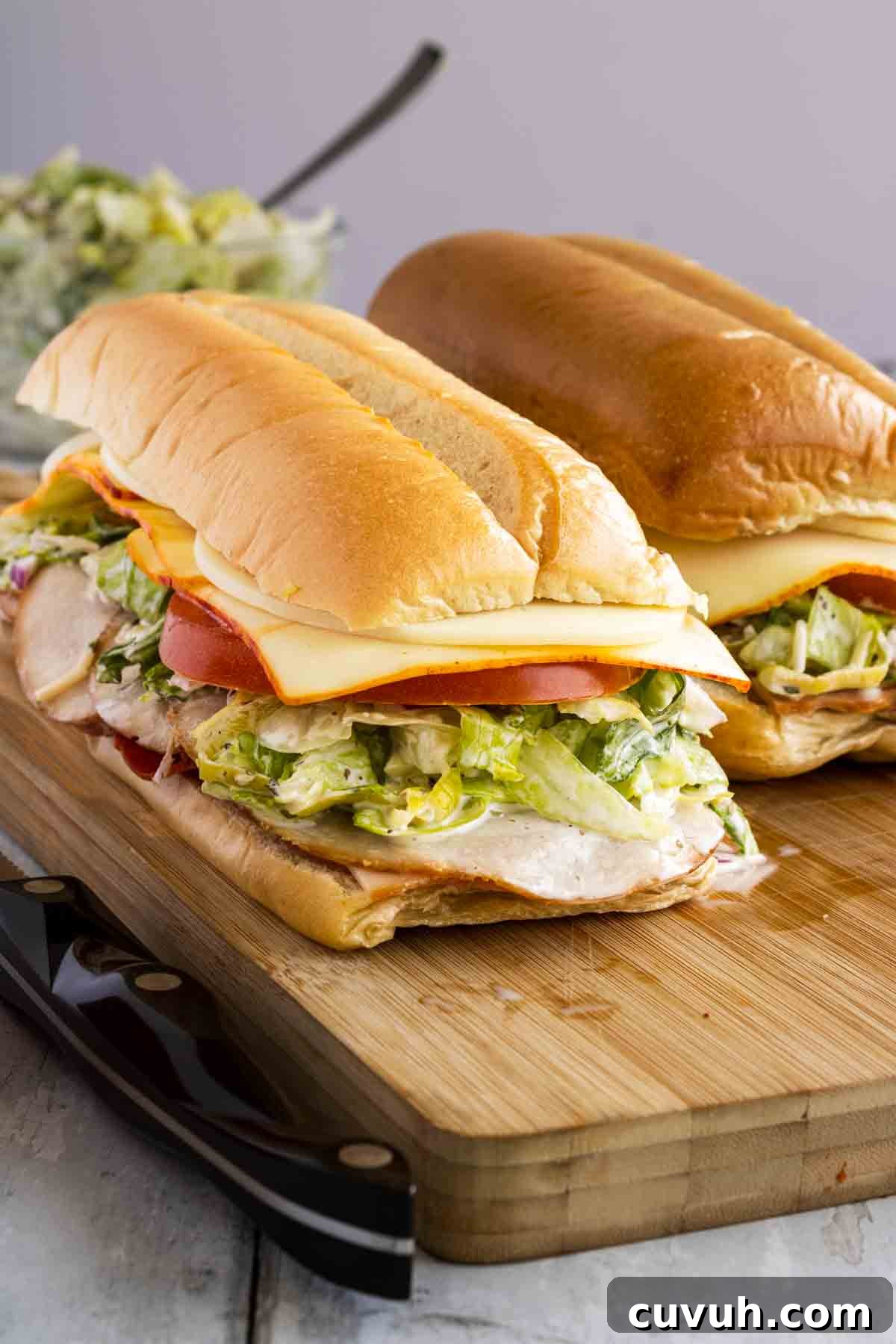 Top Grinder Salad Recipes for Flavorful Sandwiches 2 Two grinder salad sandwiches side by side.