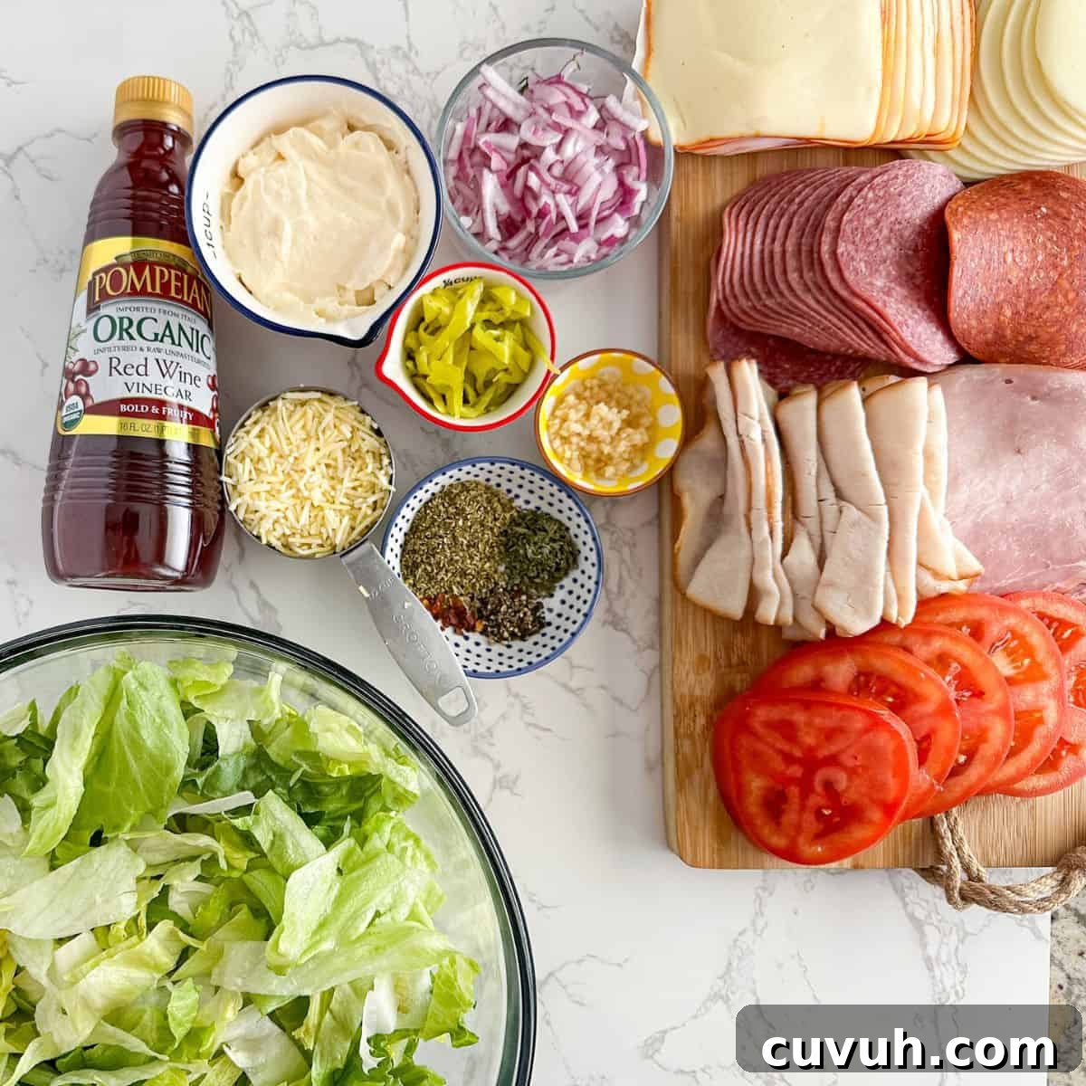 Top Grinder Salad Recipes for Flavorful Sandwiches 3 Ingredients lined up for a grinder salad.