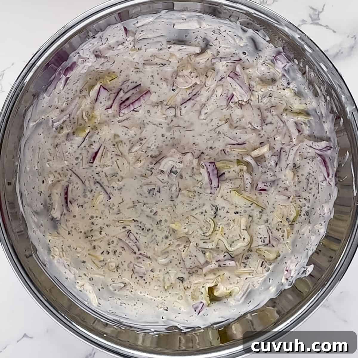 Top Grinder Salad Recipes for Flavorful Sandwiches 5 Adding the pepperoncini and onions to the mayo mixture.