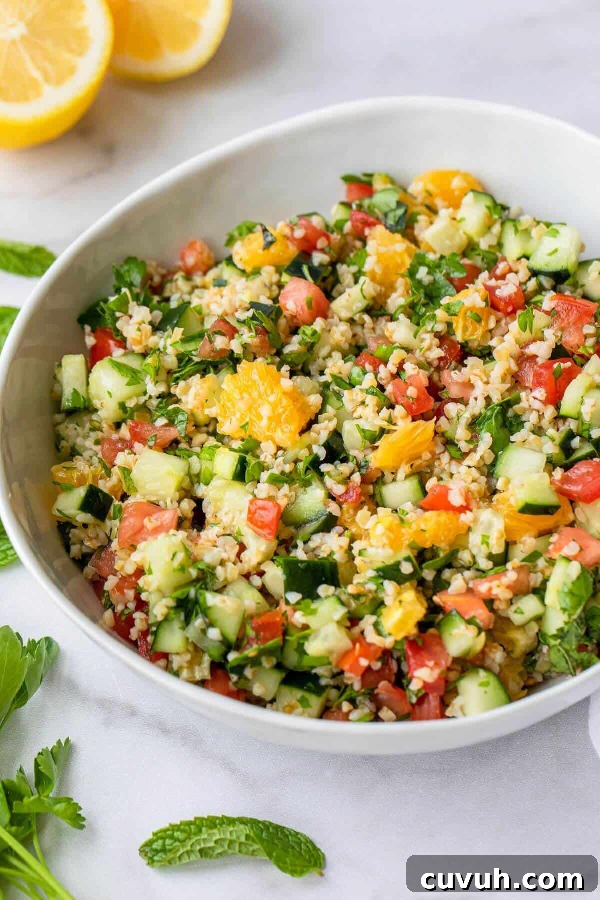 close up of healthy Mediterranean tabbouleh salad with citrus to shot texture