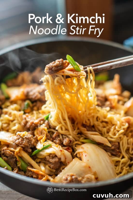 Korean Pork and Kimchi Stir Fried Noodles Recipe : Ramen Hack | BestRecipeBox.com Korean Pork and Kimchi Stir Fried Noodles Recipe : Ramen Hack in cooking pot with chopsticks