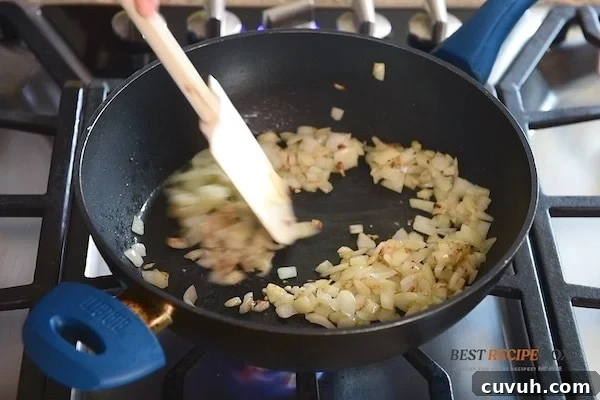 Korean Pork and Kimchi Ramen Stir-Fry Recipe 4 Cooking onions