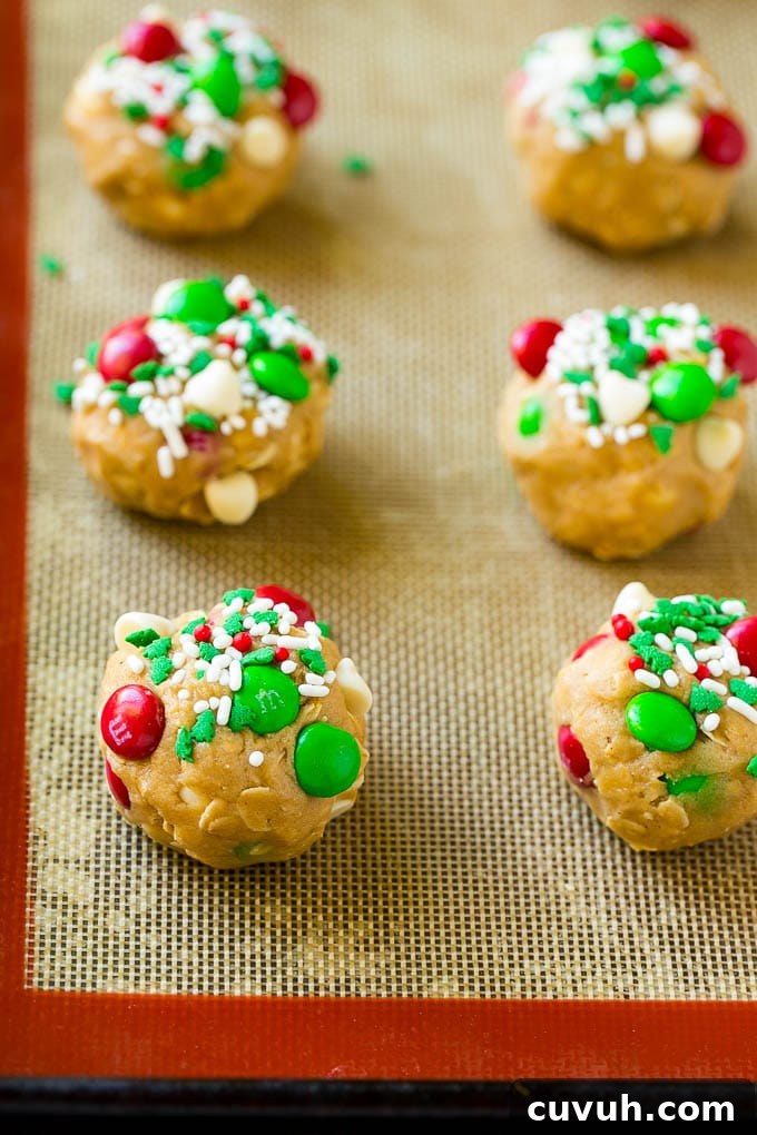 Cookie dough balls Balls of cookie dough on a baking sheet.