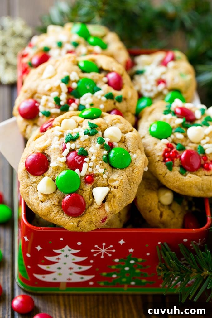 Cookies packaged as gifts Christmas monster cookies in a gift tin.