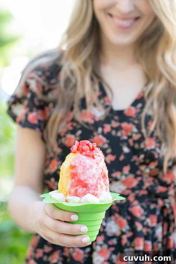 Girl holding Hawaiian shaved ice