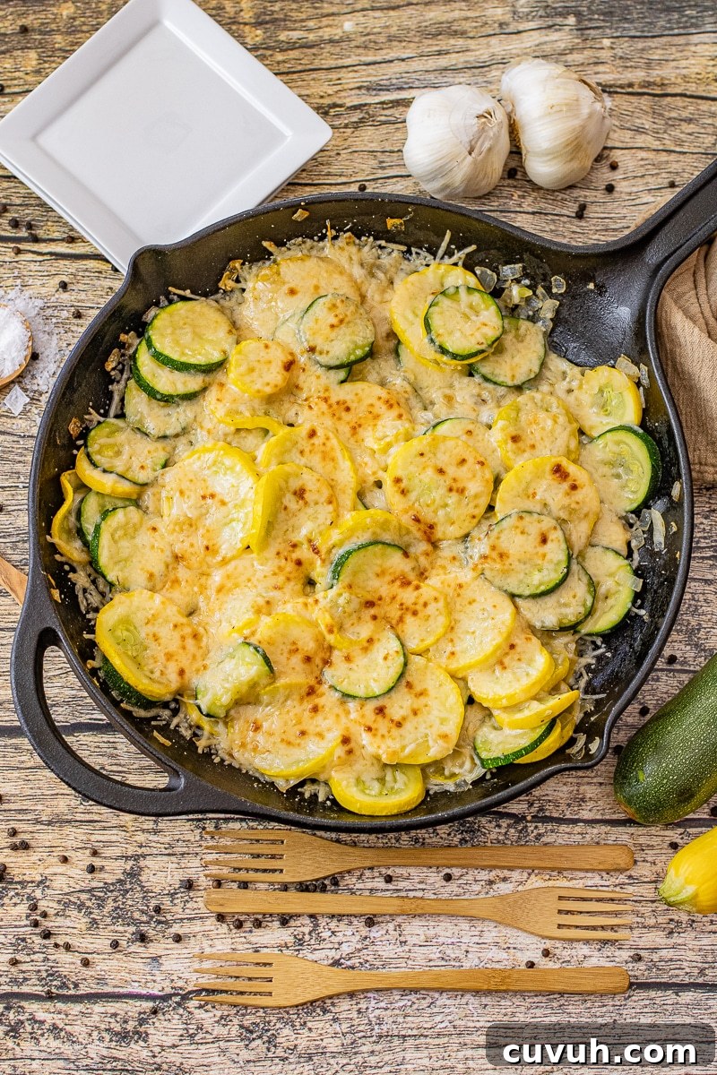 zucchini and yellow squash cooked with parmesan cheese on top