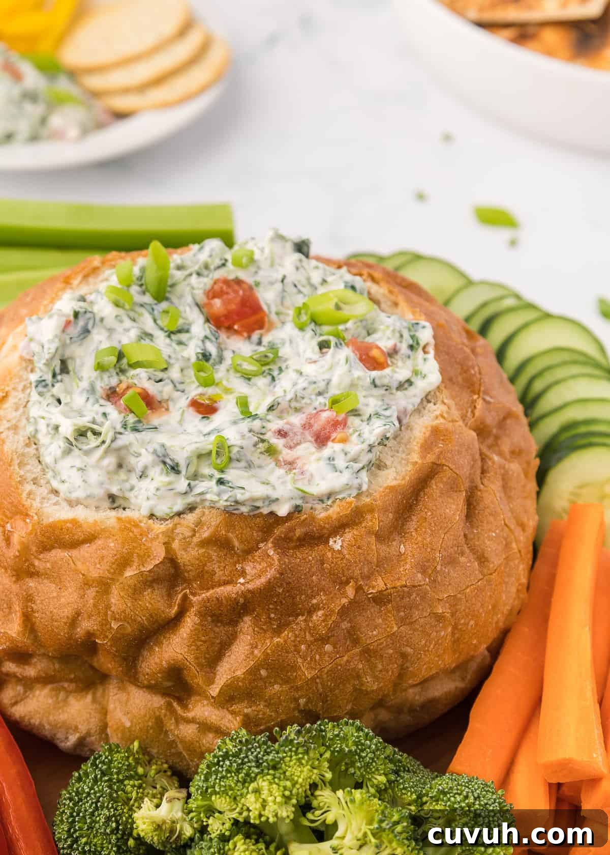 Thanksgiving Appetizers You Can Make Ahead for Stress-Free Hosting 11 Bread stuffed with cold spinach dip