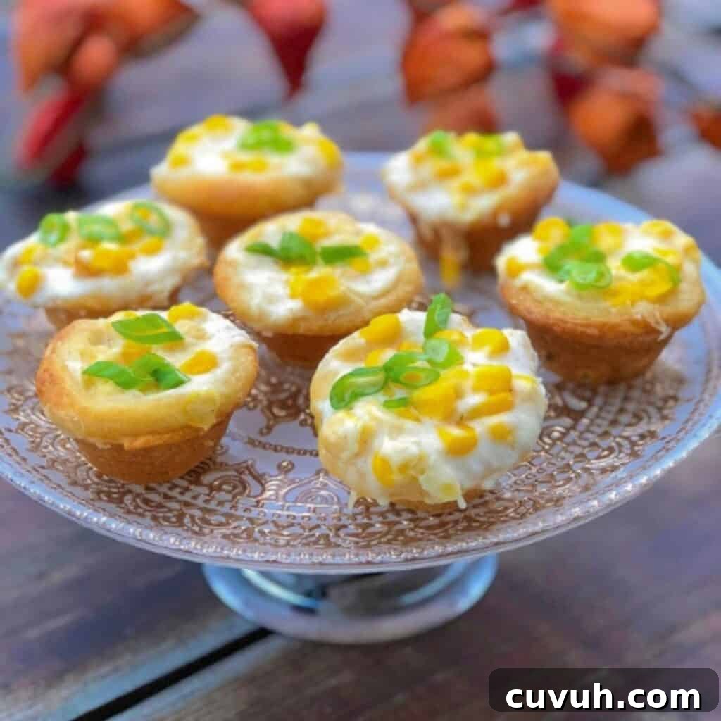 Thanksgiving Appetizers You Can Make Ahead for Stress-Free Hosting 5 biscuit cups filled wth creamed corn on plate.