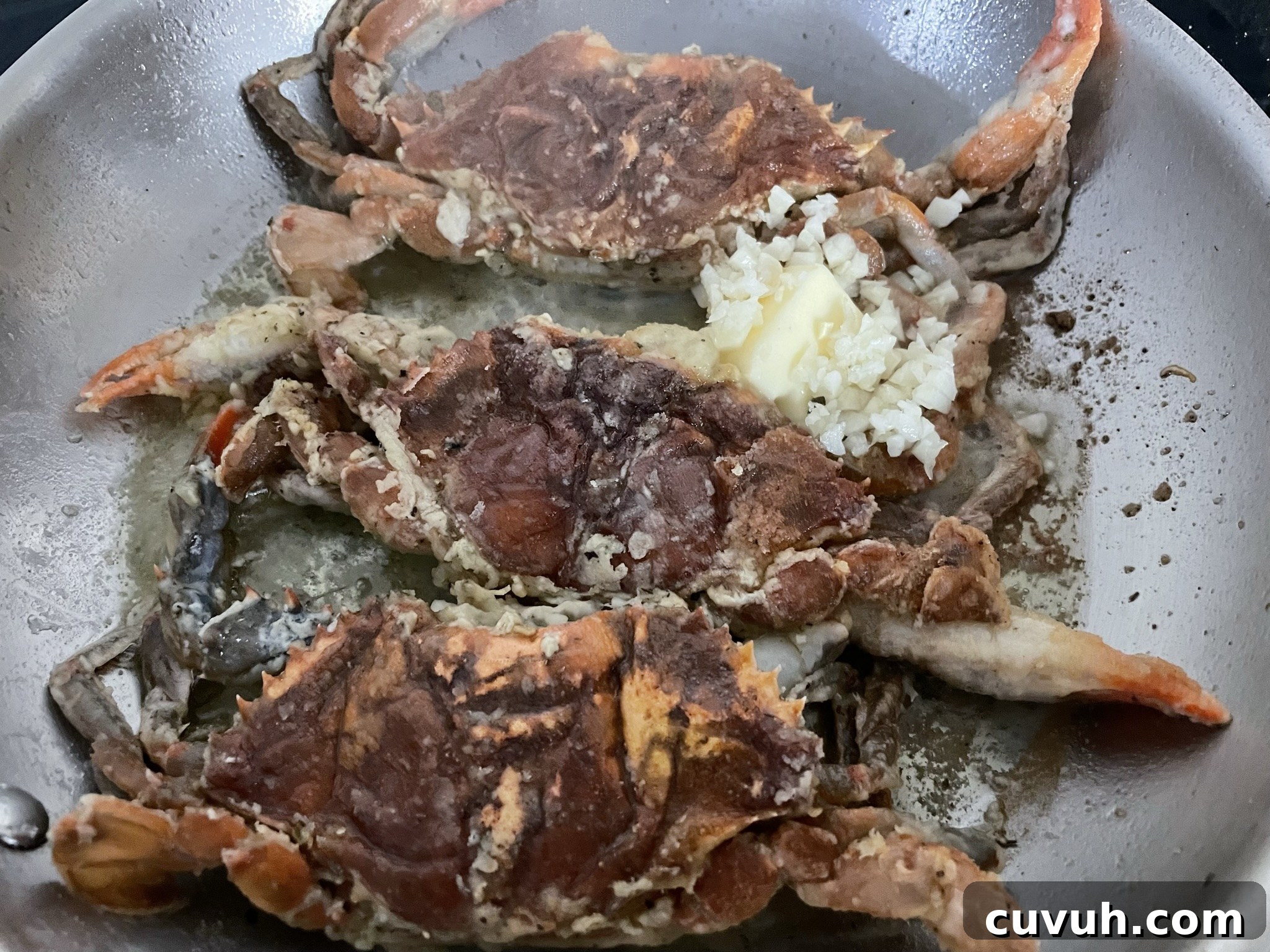 Pan-Seared Soft-Shell Crab with Garlic Butter and Fresh Herbs 6 Add butter and chopped garlic after flipping the crabs.