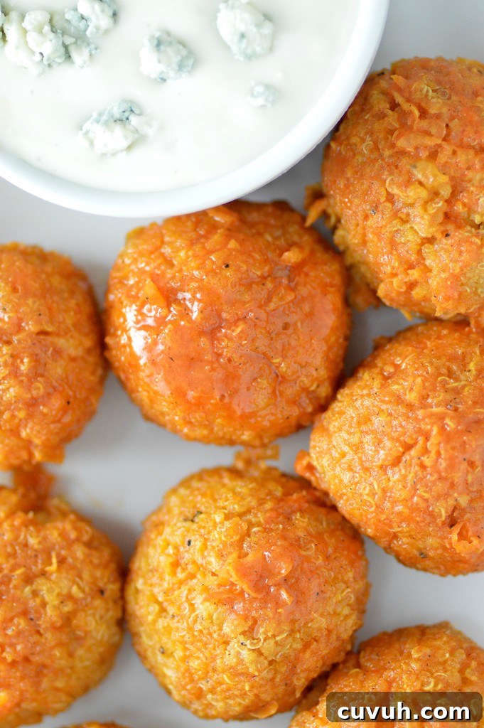 overhead shot of buffalo quinoa bites on white plate