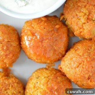 overhead shot of buffalo quinoa bites on white plate