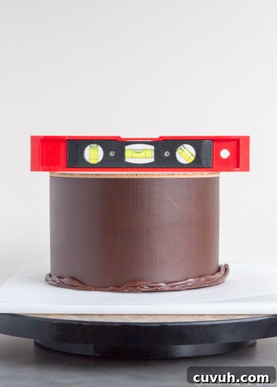 The upside down cake, with a spirit level placed on top.