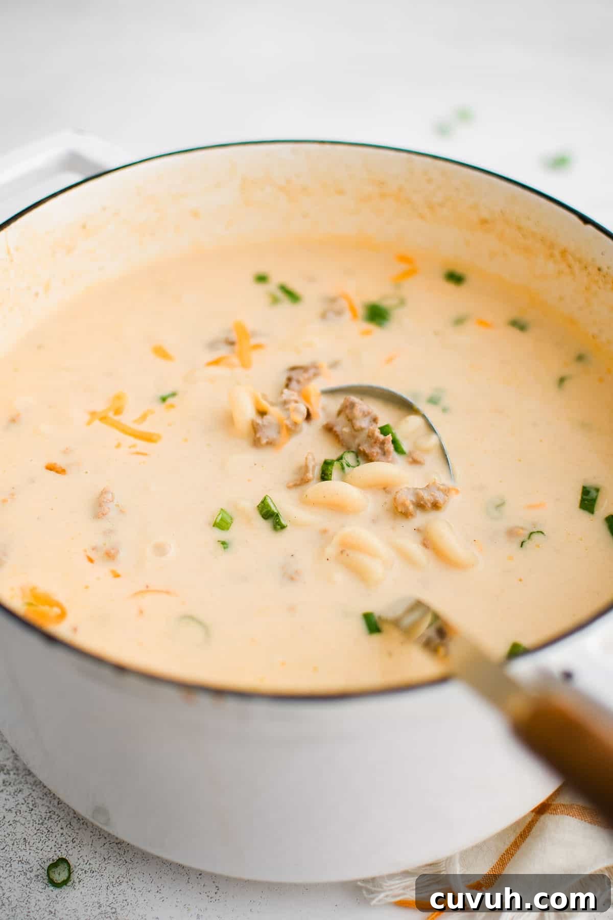 cheesy hamburger soup in a pot