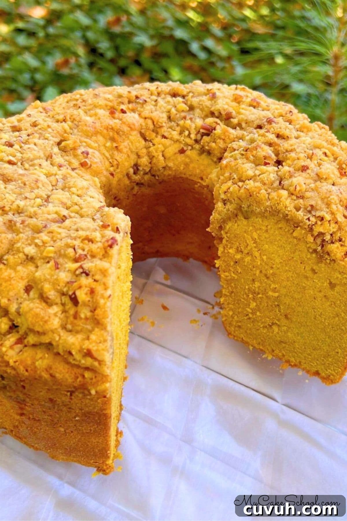 Moist Pumpkin Pound Cake Recipe for Fall Baking 2 Pumpkin Pound Cake, sliced, on a cake plate.
