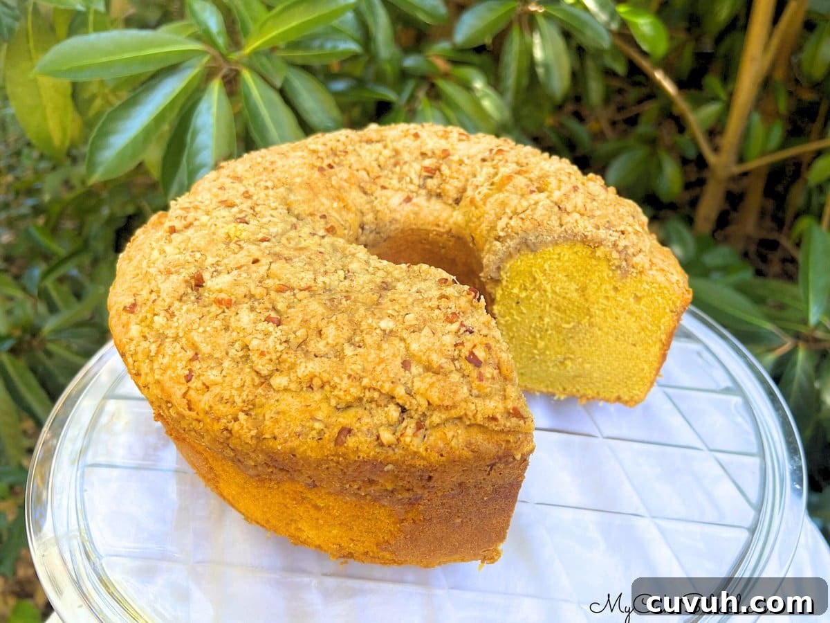 Moist Pumpkin Pound Cake Recipe for Fall Baking 7 Pumpkin Pound Cake on a cake plate.