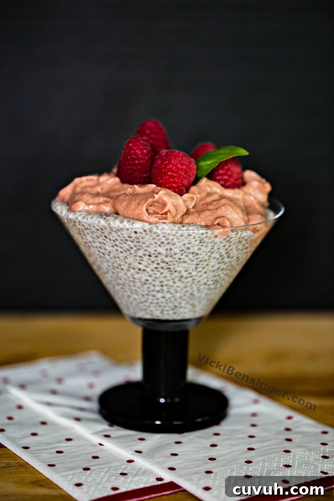 Raspberry Mousse and Chia Parfait Recipe for Light Desserts 5 Raspberry Mousse & Chia Parfait topped with fresh Raspberries and sprig of basil