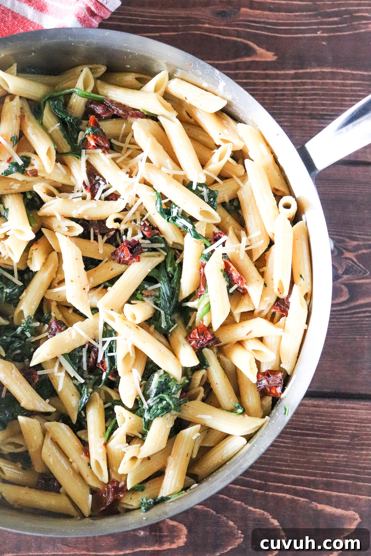 Protein Pasta with Sautéed Spinach and Sun-Dried Tomatoes 4 cooked protein pasta in skillet