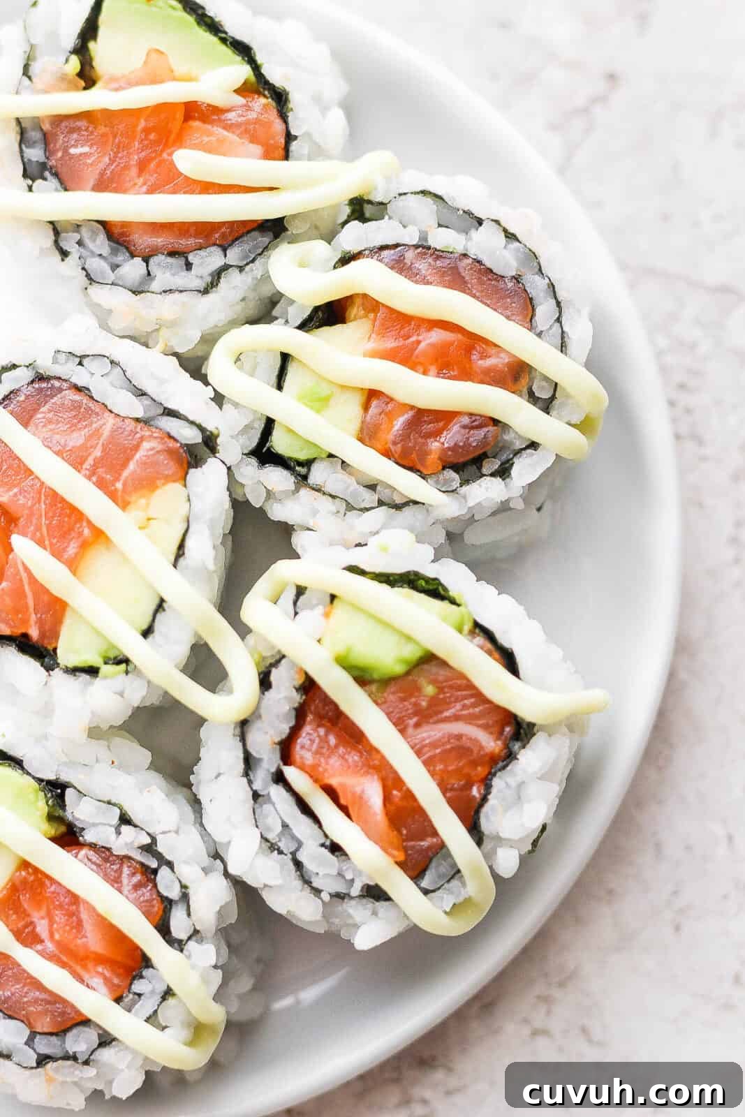 Creamy Wasabi Mayo Recipe for Sandwiches, Sushi & Dips 2 Sushi roll with wasabi mayo on top.