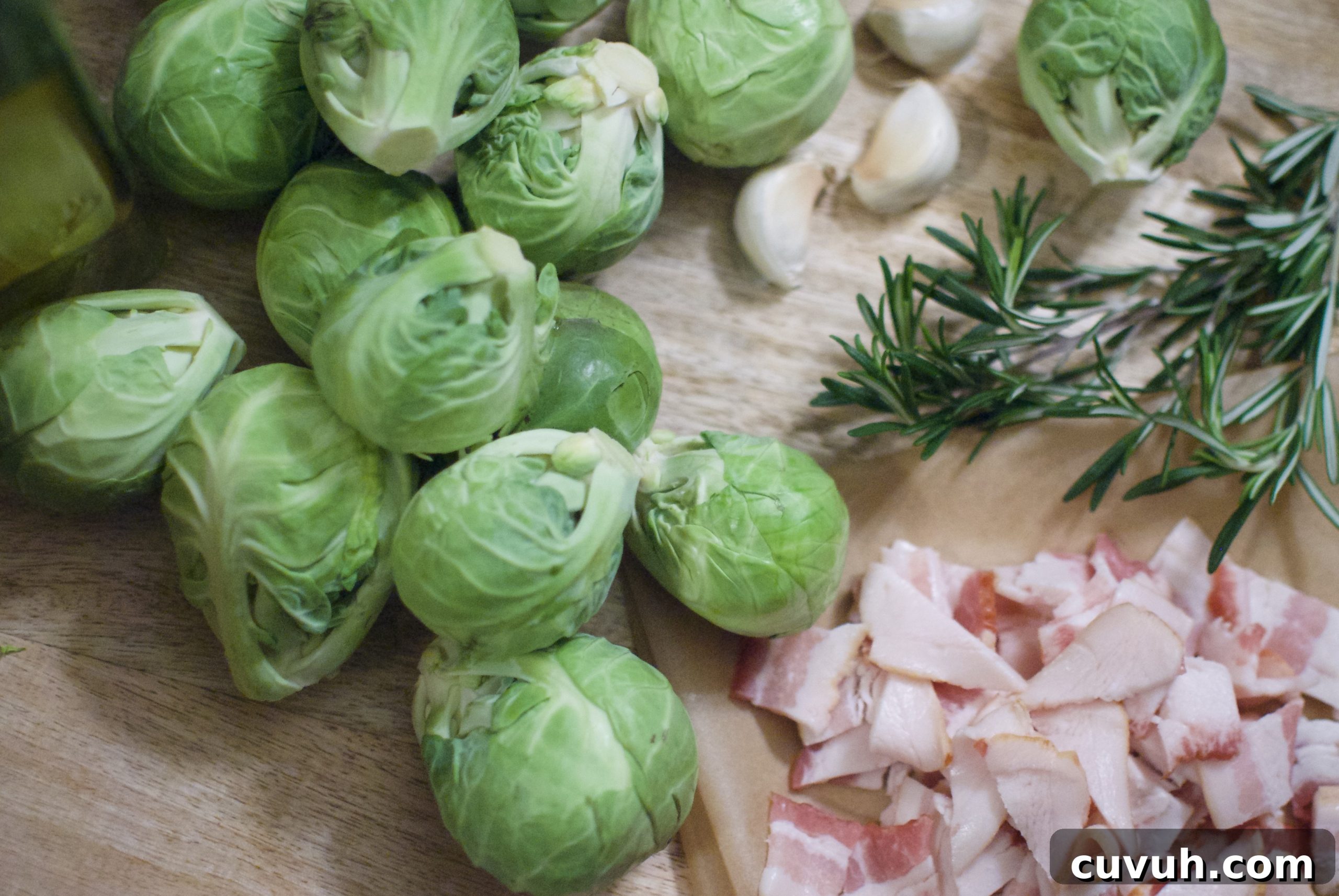 Maple-Glazed Brussels Sprouts Recipe 2 Glazed Brussels sprouts on a baking sheet