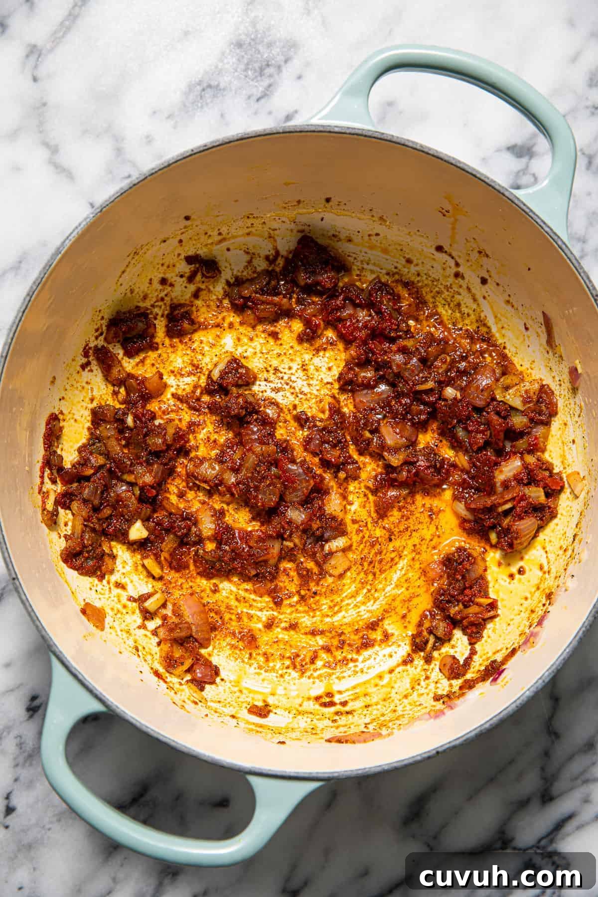 Chickpea Tikka Masala Recipe: Flavorful Vegan Curry in 30 Minutes 5 Onions and garlic with garam masala and other spices.