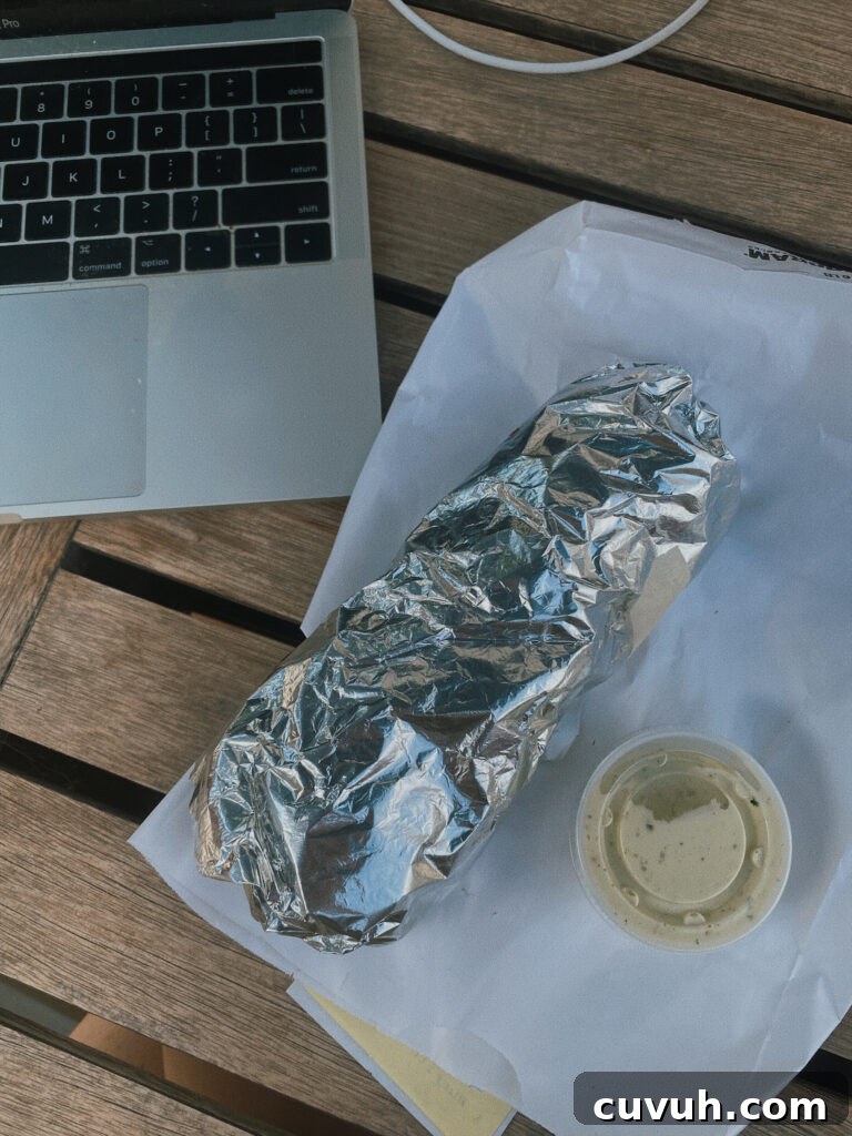 Skiers' Breakfast Burrito at Beaumont Bakery 2 breakfast burrito in tinfoil
