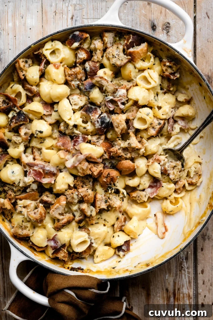 Creamy Baked Macaroni and Cheese Casserole 12 Round casserole dish filled with baked mac and cheese that's topped with croutons.