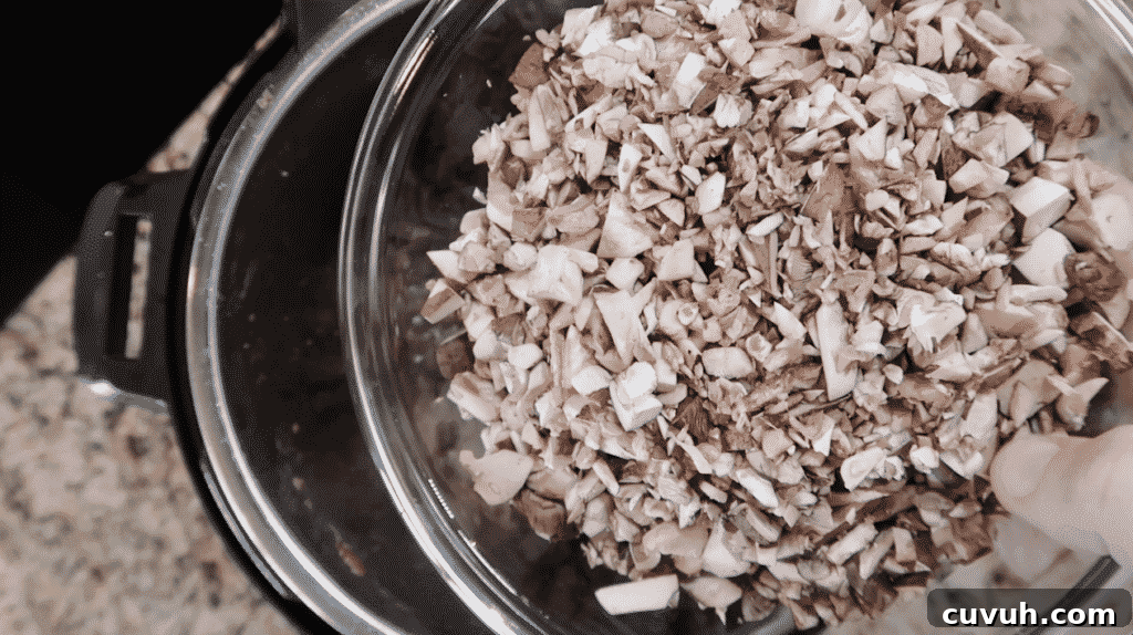 Adding mushrooms to pot