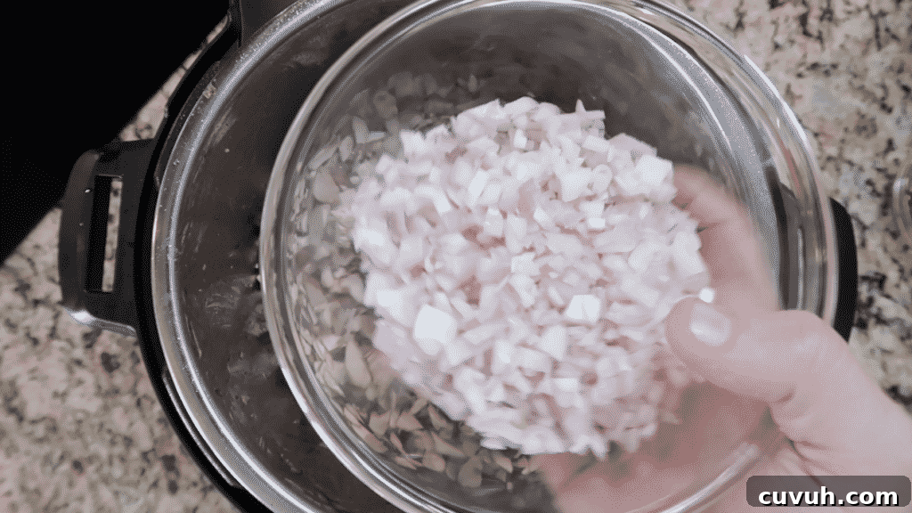 Adding shallots to pot