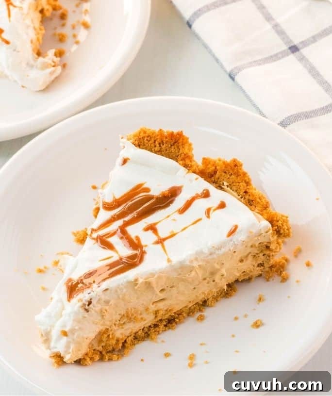 slice of caramel cream pie on white plate