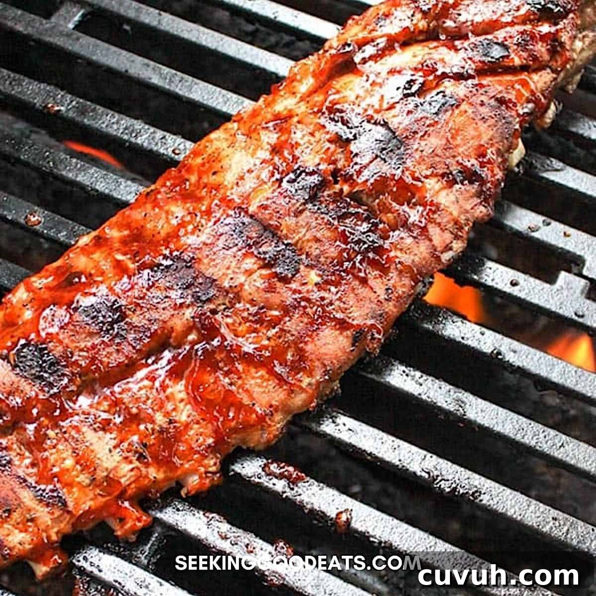 Finishing off a rack of ribs over a hot grill.