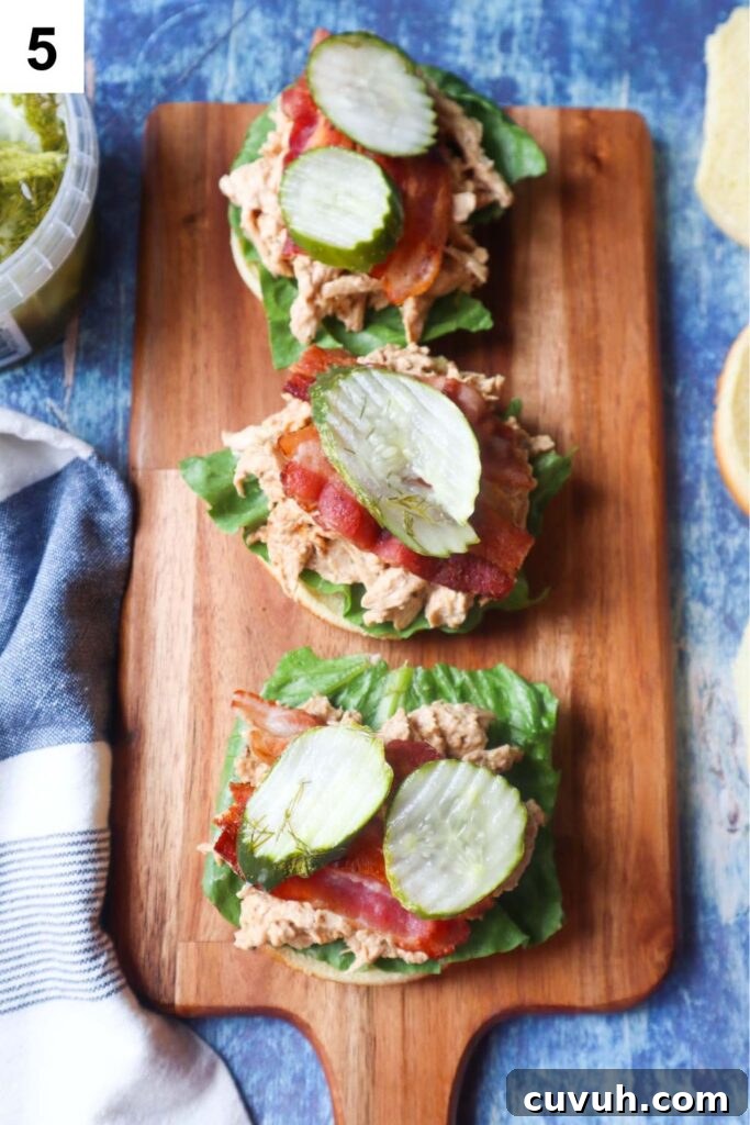 Smoked Gouda Chicken Bacon Ranch Sandwich Recipe 8 cutting board with assembled sandwiches without tops