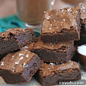 A stack of Salted Fudge Brownie squares.