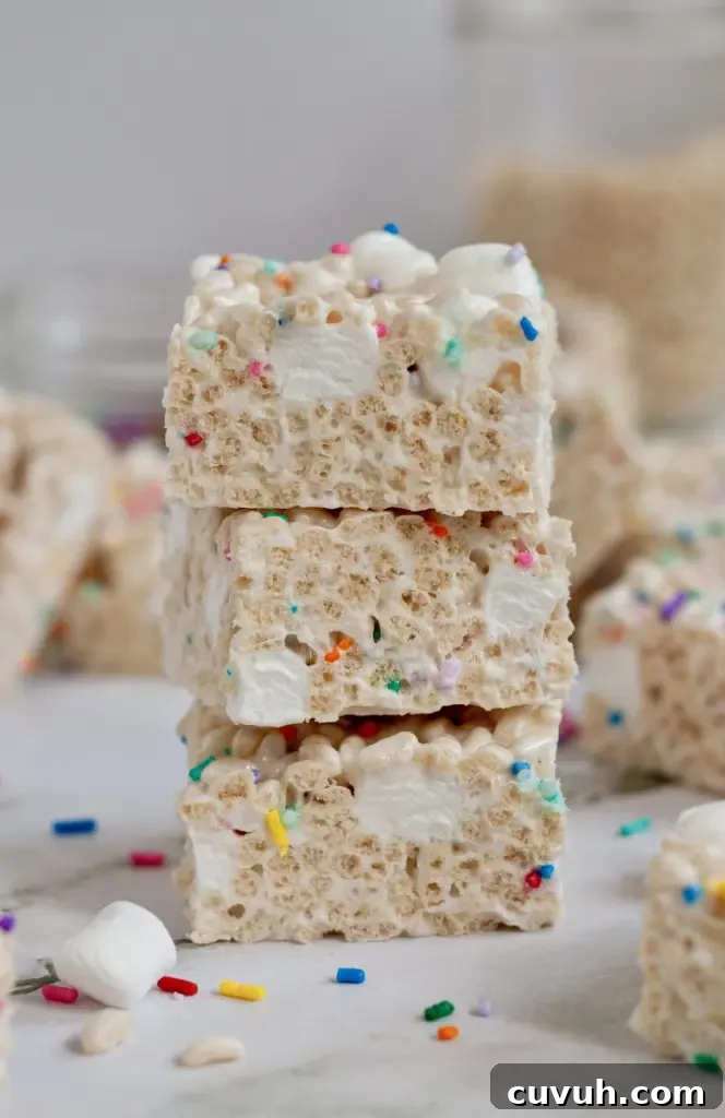 Classic rice krispie treats with bright white mini marshmallows and colorful sprinkles.