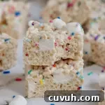 Classic rice krispie treats with bright white mini marshmallows and colorful sprinkles.