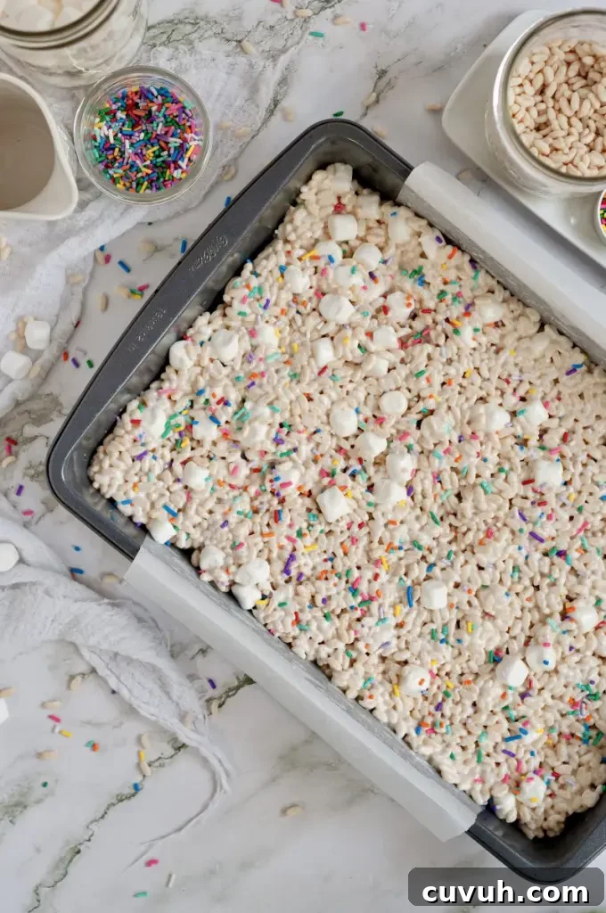 Classic rice krispie treats with bright white mini marshmallows and colorful sprinkles.