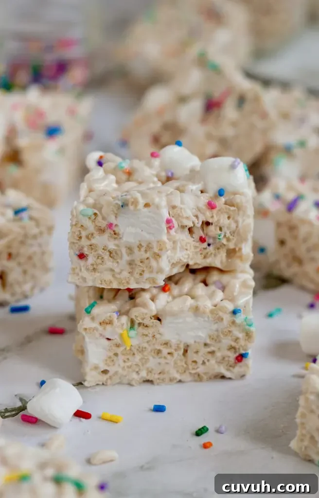 Classic rice krispie treats with bright white mini marshmallows and colorful sprinkles.